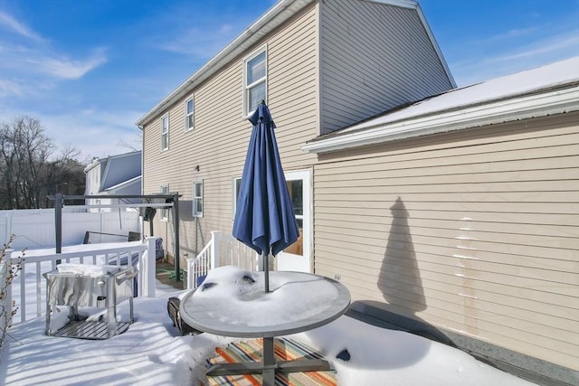 view of snow covered property