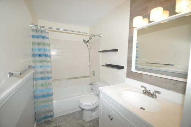 bathroom with vanity, shower / bath combo with shower curtain, and toilet