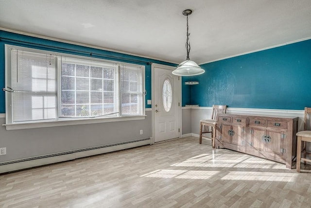 entrance foyer with light hardwood / wood-style floors and a baseboard heating unit