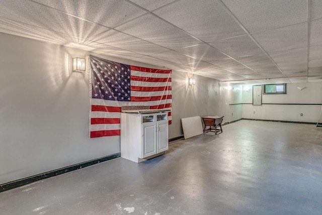 basement with a drop ceiling