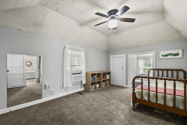 66 Squantum Rd, Jaffrey, NH 03452 - carpeted bedroom featuring cooling unit, multiple windows, vaulted ceiling, a textured ceiling, and a ceiling fan