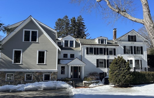 view of front of house with stone siding