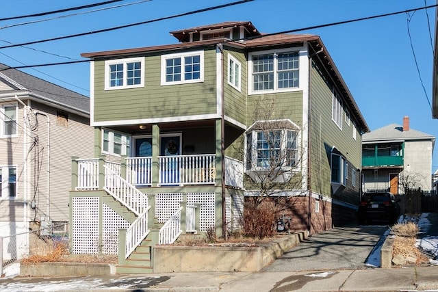 view of front of property featuring covered porch