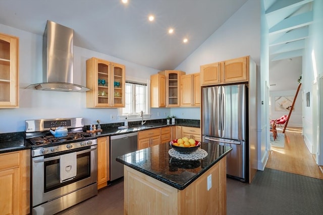 kitchen featuring light brown cabinetry, sink, a center island, ventilation hood, and stainless steel appliances