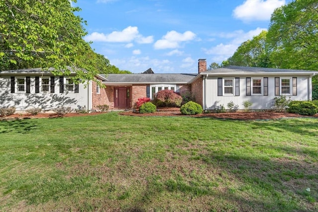 12 Queens Cir, Sharon, MA 02067 - single story home featuring a chimney and a front yard