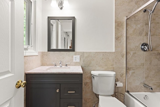 12 Queens Cir, Sharon, MA 02067 - bathroom with toilet, vanity,  shower combination, and tile walls