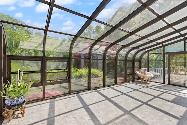 12 Queens Cir, Sharon, MA 02067 - unfurnished sunroom with vaulted ceiling