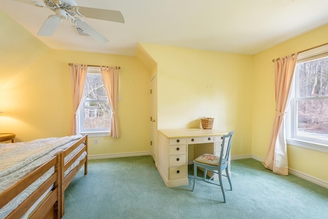 bedroom with baseboards, light colored carpet, a ceiling fan, and vaulted ceiling