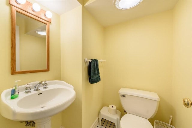 bathroom with a sink and toilet