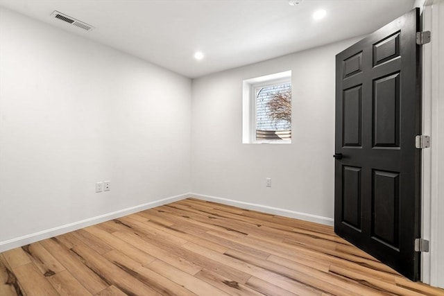 empty room featuring light hardwood / wood-style floors