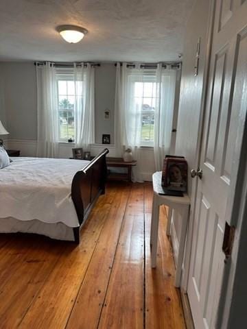 bedroom featuring light wood-type flooring