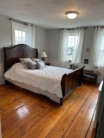 bedroom with light wood-type flooring