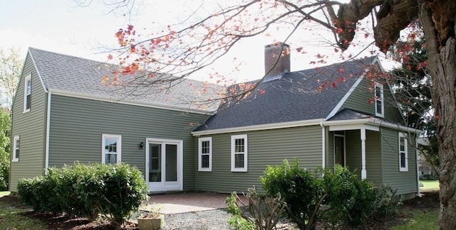 rear view of property featuring a patio