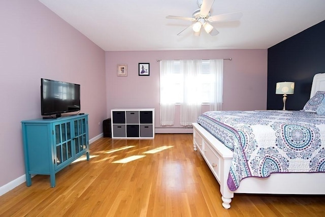238 Rock St Unit C8, Norwood, MA 02062 - bedroom featuring light wood-style flooring, baseboard heating, and baseboards