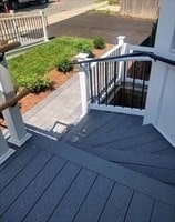 wooden terrace with a porch