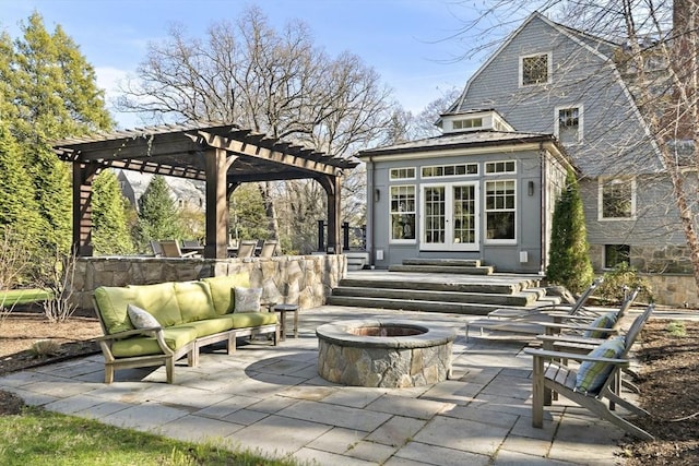 222 Prince St, Newton, MA 02465 - view of patio / terrace with a pergola, an outdoor living space with a fire pit, and french doors