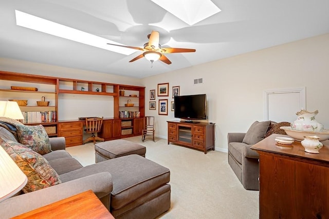 9 Summerfield Dr Unit 8, Grafton, MA 01560 - living room featuring light carpet, a skylight, visible vents, baseboards, and a ceiling fan