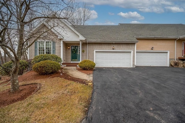9 Summerfield Dr Unit 8, Grafton, MA 01560 - view of front of home with a garage, a shingled roof, and aphalt driveway