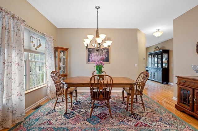 9 Summerfield Dr Unit 8, Grafton, MA 01560 - dining room with a chandelier, visible vents, light wood-style flooring, and baseboards