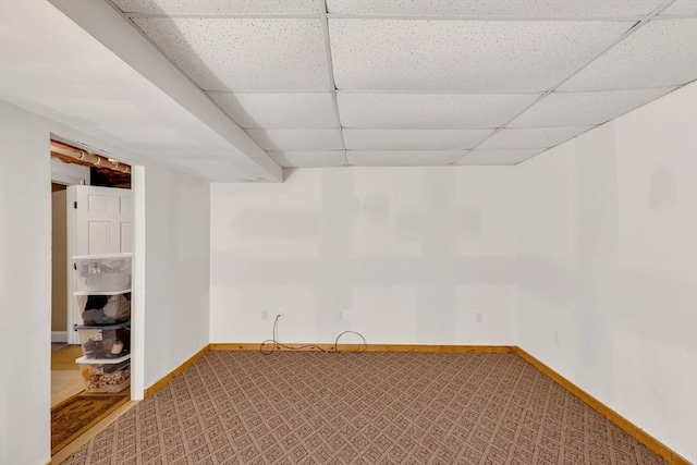 17 Hampton Ct Unit 17, Mashpee, MA 02649 - below grade area with a paneled ceiling, carpet, and baseboards