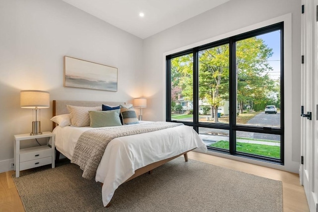 bedroom featuring light wood-style floors and recessed lighting