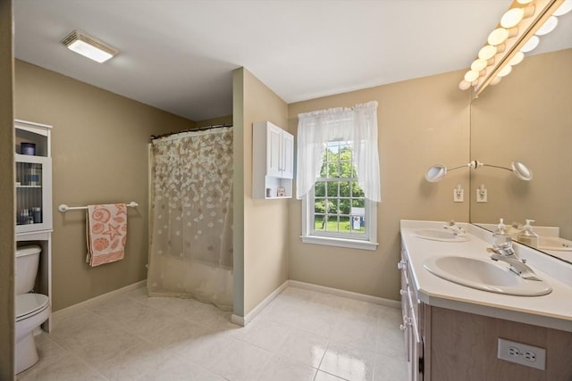 88 Amelia Way, Barnstable, MA 02648 - bathroom with double vanity, curtained shower, and tile patterned floors