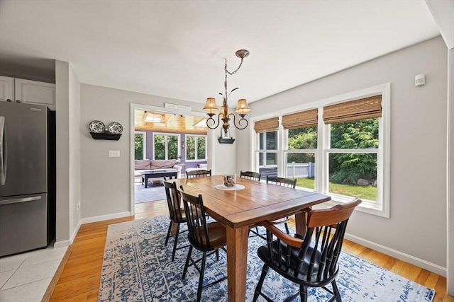 88 Amelia Way, Barnstable, MA 02648 - dining space featuring a chandelier and light wood-type flooring
