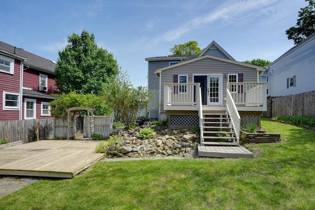 14 Mountain Ave, Marlborough, MA 01752 - back of property with a deck and stairway