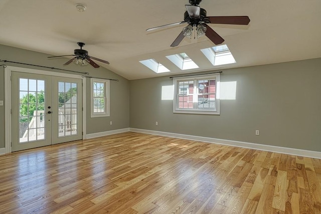 14 Mountain Ave, Marlborough, MA 01752 - unfurnished room featuring a skylight, ceiling fan, lofted ceiling, light wood-type flooring, and baseboards