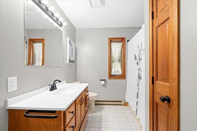 bathroom featuring tile patterned flooring, curtained shower, toilet, vanity, and a baseboard radiator