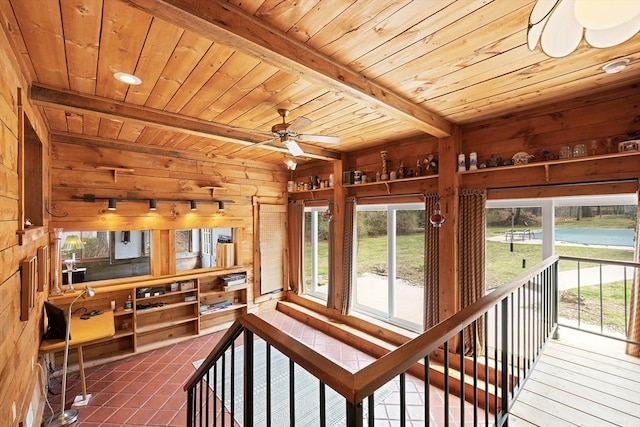 interior space featuring a ceiling fan