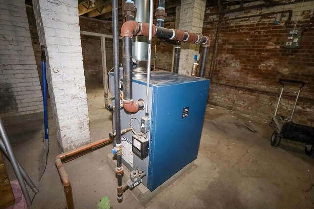 utility room featuring a heating unit