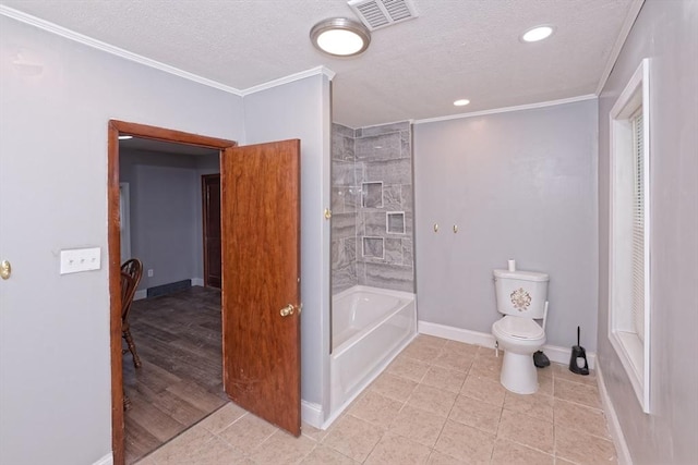 full bathroom featuring ornamental molding, a textured ceiling, toilet, baseboards, and tile patterned floors
