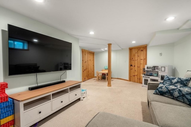 living room with recessed lighting, baseboards, and carpet floors