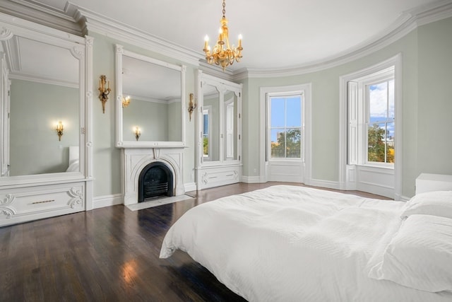 bedroom featuring a chandelier, hardwood / wood-style flooring, and ornamental molding