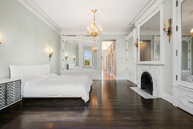 bedroom featuring a notable chandelier, crown molding, and dark hardwood / wood-style floors