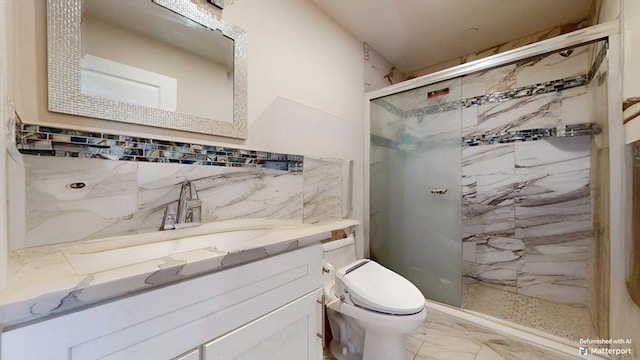 full bath featuring marble look tile flooring, tile walls, a stall shower, toilet, and vanity