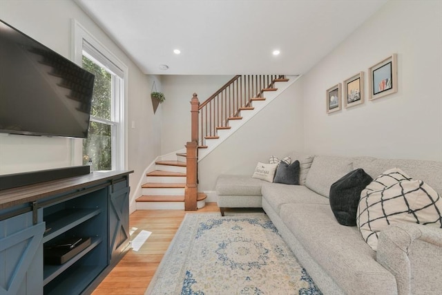 475 E St, Dedham, MA 02026 - living area featuring stairs, light wood-style floors, recessed lighting, and baseboards