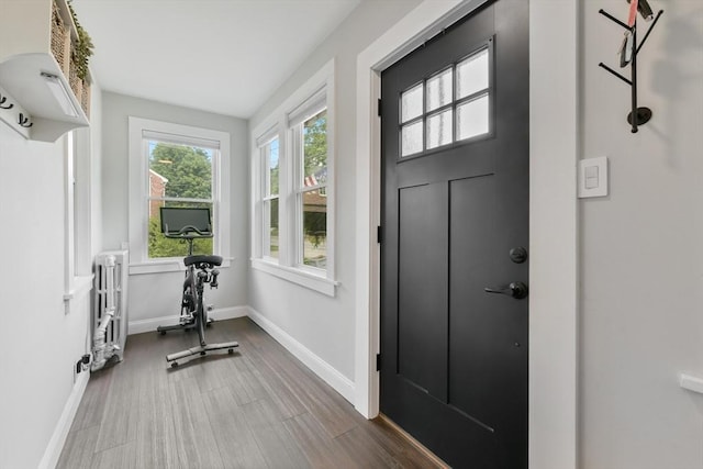 475 E St, Dedham, MA 02026 - entrance foyer featuring baseboards and wood finished floors
