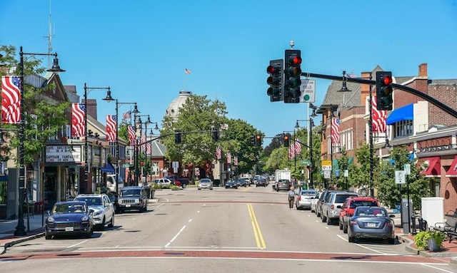 475 E St, Dedham, MA 02026 - view of asphalt street with traffic lights, street lights, curbs, and sidewalks