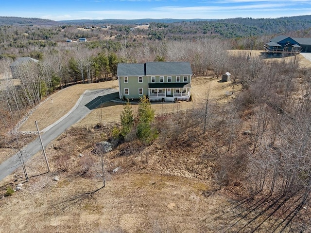 bird's eye view with a forest view