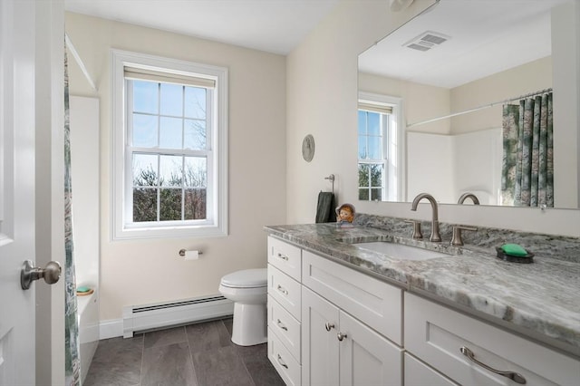 bathroom featuring vanity, a shower with shower curtain, toilet, and baseboard heating