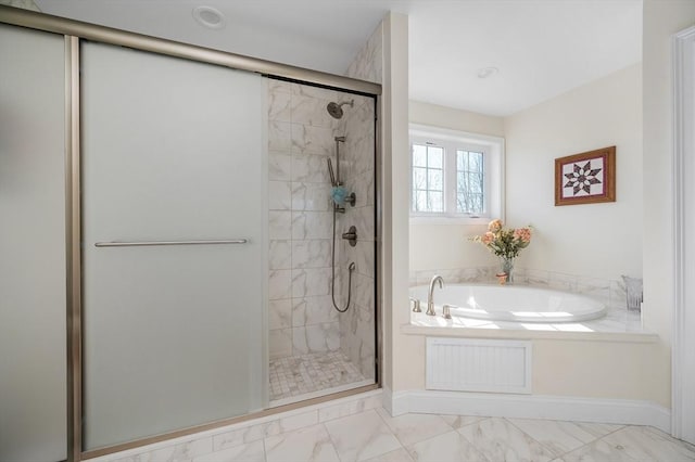 full bathroom with baseboards, marble finish floor, a stall shower, and a bath