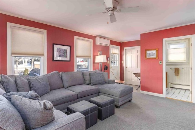 living room featuring a baseboard heating unit, carpet floors, a wealth of natural light, and crown molding