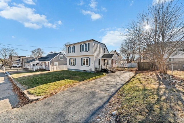 view of property with a front lawn