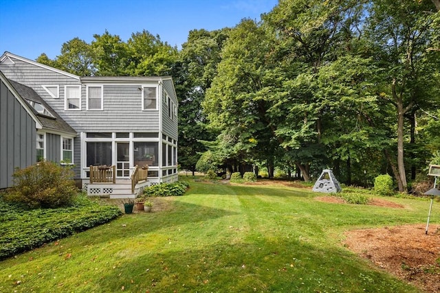 view of yard with a sunroom