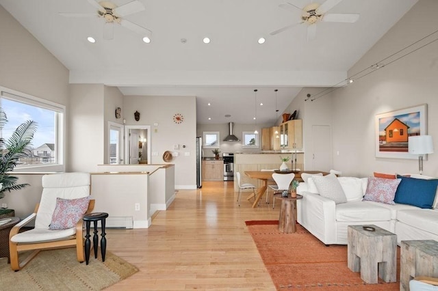 32 Northern Blvd, Newbury, MA 01951 - living room with recessed lighting, a ceiling fan, light wood-style flooring, and high vaulted ceiling