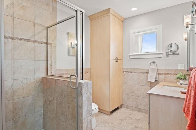 32 Northern Blvd, Newbury, MA 01951 - bathroom with vanity, tile walls, a stall shower, and toilet