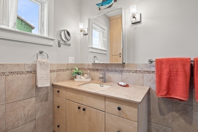 32 Northern Blvd, Newbury, MA 01951 - bathroom featuring vanity, a healthy amount of sunlight, and tile walls