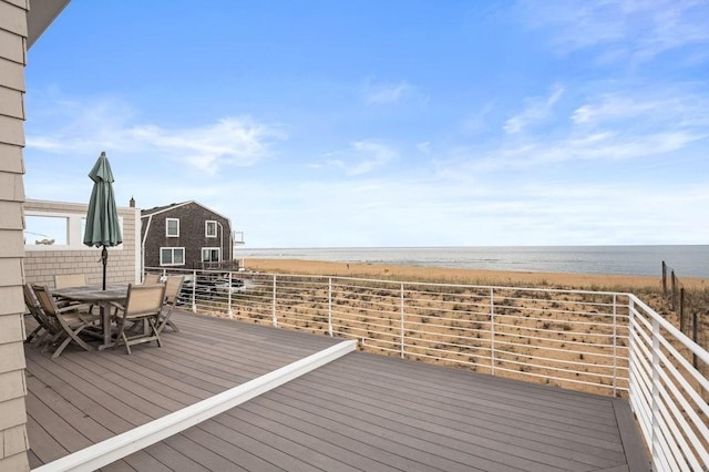 32 Northern Blvd, Newbury, MA 01951 - wooden terrace featuring a water view, a view of the beach, and outdoor dining space